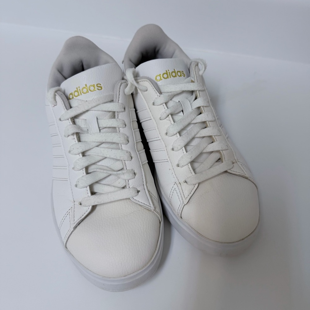 adidas White Sneakers with Gold Logo Accents